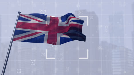 Animation-Des-Zielfernrohrscans-über-Der-Wehenden-Britischen-Flagge-Gegen-Hohe-Gebäude