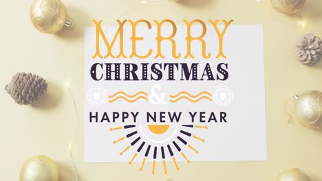 Animation-of-merry-christmas-text-banner-against-pinecone,-bauble-and-fairy-lights-on-pink-surface