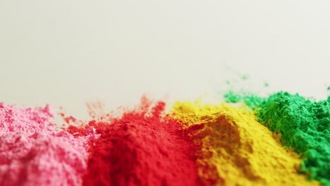 Video-of-multi-coloured-powders-with-copy-space-on-white-background