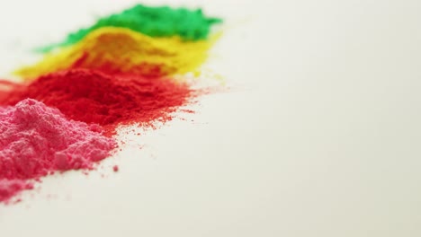 Video-of-multi-coloured-powders-with-copy-space-on-white-background