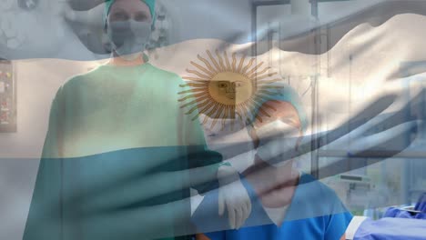 Animación-De-Ondear-La-Bandera-Argentina-Sobre-Un-Cirujano-Masculino-Y-Femenino-Caucásico-En-El-Hospital