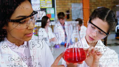 Animation-of-mathematical-equations-over-two-diverse-girls-in-science-class-in-laboratory-at-school
