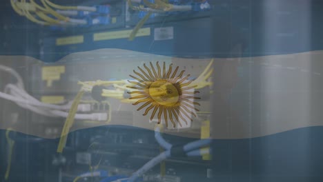 Animation-of-waving-argentina-flag-against-close-up-of-a-computer-server