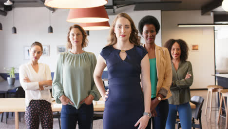 Portrait-of-confident-diverse-businesswomen-standing-in-office-looking-to-camera,-in-slow-motion