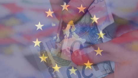 Animation-of-flag-of-european-union,-euros-and-financial-data-processing