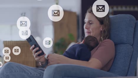 Animation-of-social-media-icons-over-caucasian-woman-holding-baby-and-using-smartphone