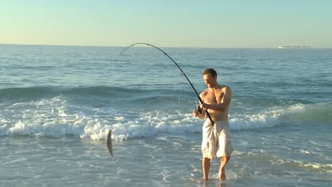 Man-fishing-on-the-beach