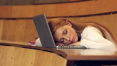 Student-asleep-sitting-in-class