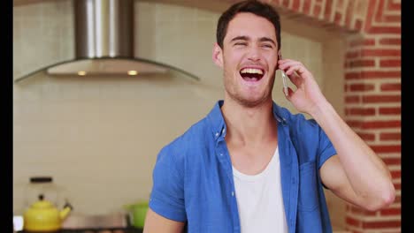 Handsome-happy-man-having-a-phone-call