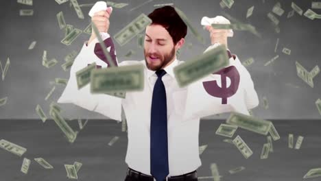 Composite-video-of-businessman-holding-money-bags-