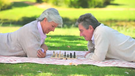 Mature-couple-playing-chess