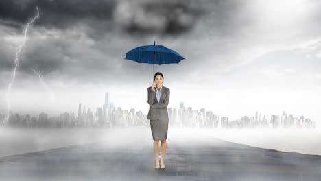 Composite-image-of-businesswoman-holding-an-umbrella