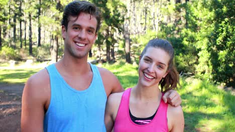 Smiling-athletic-couple-jogging-together