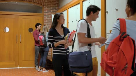 Few-students-chatting-in-hallway