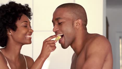 Smiling-couple-having-breakfast-together-