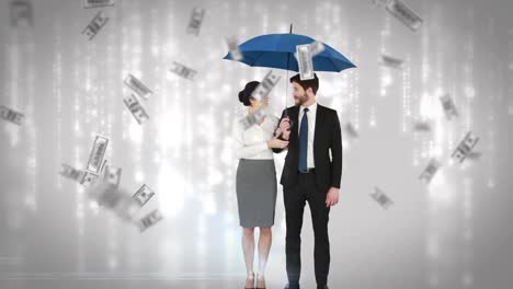 -Business-people-standing-under-umbrella
