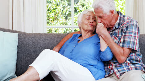 Senior-couple-talking-in-sitting-room