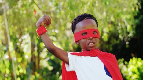 Little-boy-posing-in-costume-of-superhero