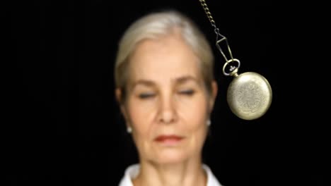 Woman-mesmerised-by-a-pendulum-movement-