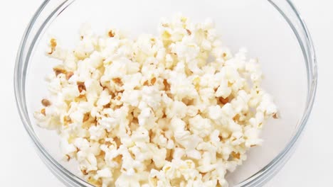 Popcorn-falling-in-a-bowl