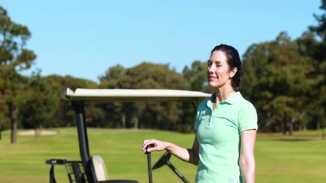 Happy-female-golfer-playing-golf