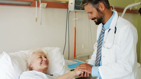 Doctor-consoling-senior-patient