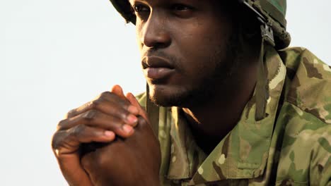 Thoughtful-military-soldier-sitting