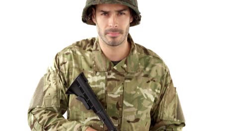 Soldier-standing-with-rifle-on-white-background