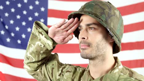 Soldier-saluting-in-front-of-American-flag