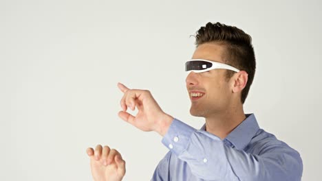 Man-using-visual-reality-headset-on-white-background