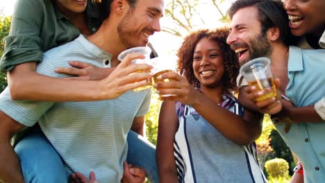 Group-of-friends-toasting-a-glass-of-beer