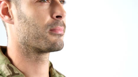 Close-up-of-soldier-taking-pledge-on-white-background