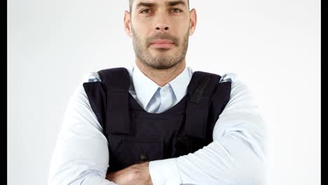 Security-guard-wearing-bulletproof-vest-on-white-background