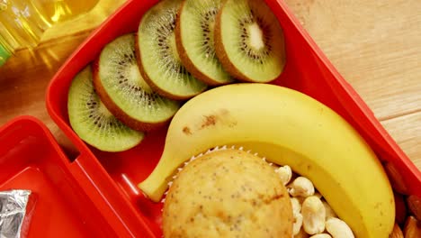 Close-up-of-dried-fruits-with-banana,-kiwifruit-and-muffin