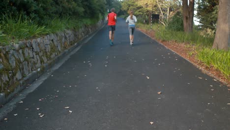 Couple-jogging-on-the-open-road