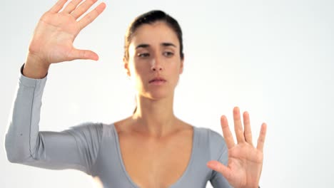 Woman-gesturing-on-white-background