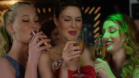 Female-friends-toasting-champagne