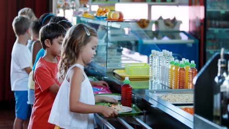 Kids-taking-meal-from-counter