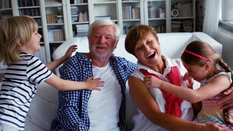 Grandchildren-embracing-their-grandparents