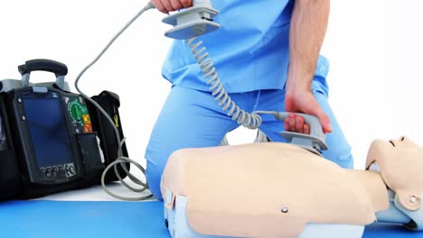 Male-paramedic-during-cardiopulmonary-resuscitation-training