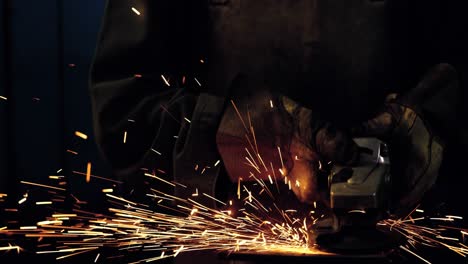 Female-welder-working-at-work-shop