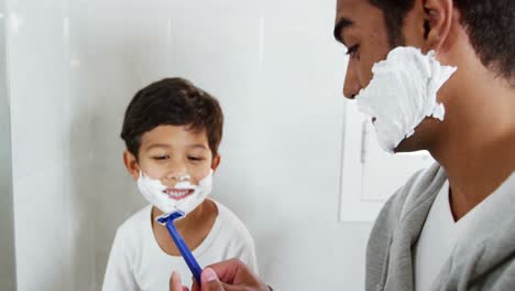Father-and-son-shaving-together