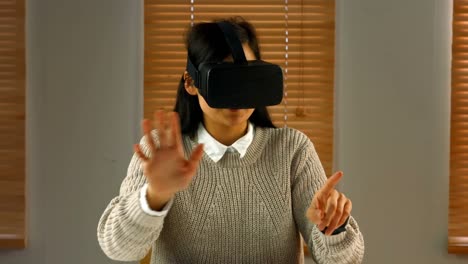 Female-business-executive-using-virtual-glasses