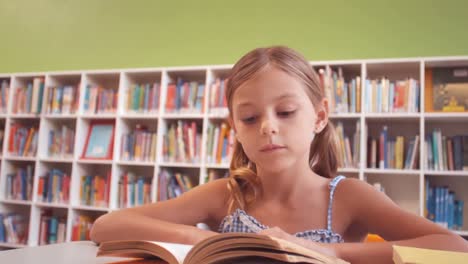Schoolgirl-reading-book-in-library