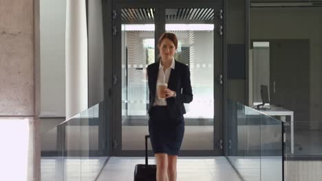 Businesswoman-walking-with-luggage