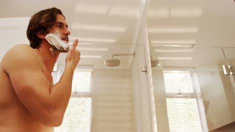 Man-applying-shaving-foam