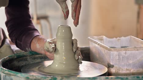 Male-potter-making-pot