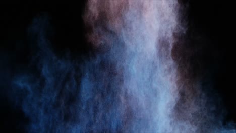 Blue-and-red-dust-powder-blowing-against-black-background