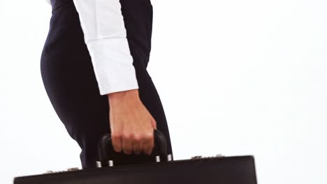 Businesswoman-walking-with-briefcase