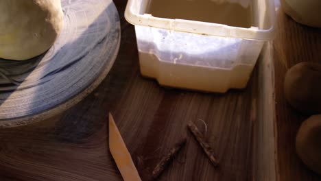 Molded-clay-on-pottery-wheel